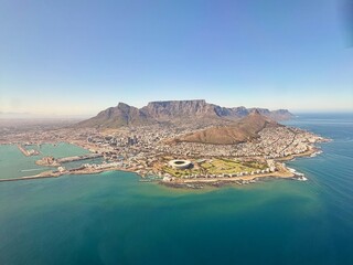 Fototapeta premium Aerial view of Cape Town showing Table Mountain and the city's coastline.