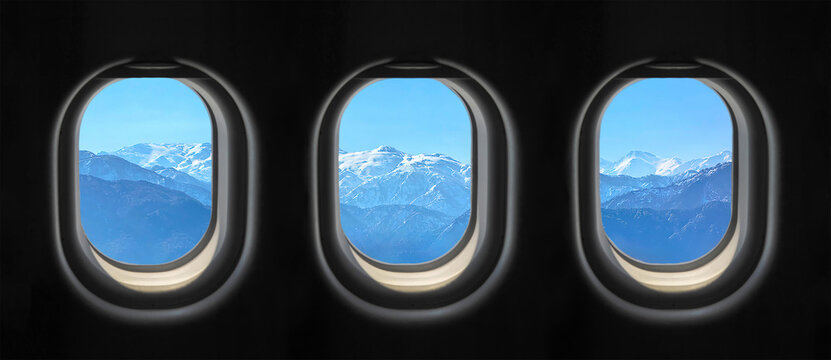 View outside the plane window. Photograph of the view through the plane window.