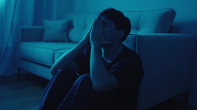 Stressed Man Experiencing Anxiety and Mental Distress
