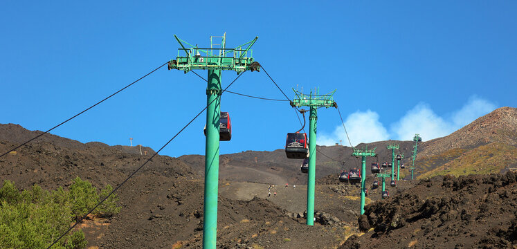 MOUNT ETNA SICILY ITALY: Funivia cable car, ropeway from Rifugio Sapienza on the slope of volcano Mount Etna

