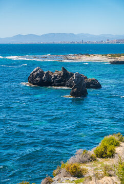 Sunny summer day at the crystal clear beach of Tabarca Island Spain