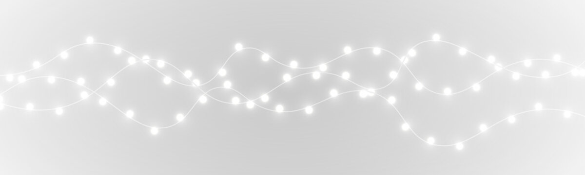Bright festive Christmas lights PNG with soft glow effect. Elegant holiday garland string lights for designs. Transparent festive PNG Christmas overlay for banners