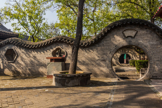 Round gate to a garden in Hongmen castle in Wang Family Courtyard in Lingshi county, China