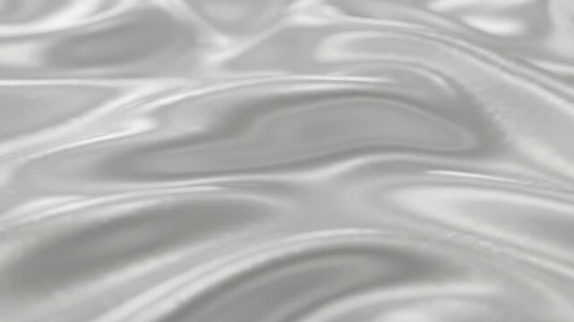 Shiny silver background with smooth reflective texture, premium abstract backdrop for luxury branding, beauty campaigns, editorial layouts and packaging design, metallic glow, soft highlights and