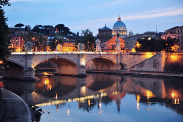 Obraz premium Night View of Ponte Vittorio Emanuele II and St. Peter’s Basilica Reflection in Tiber River, Rome
