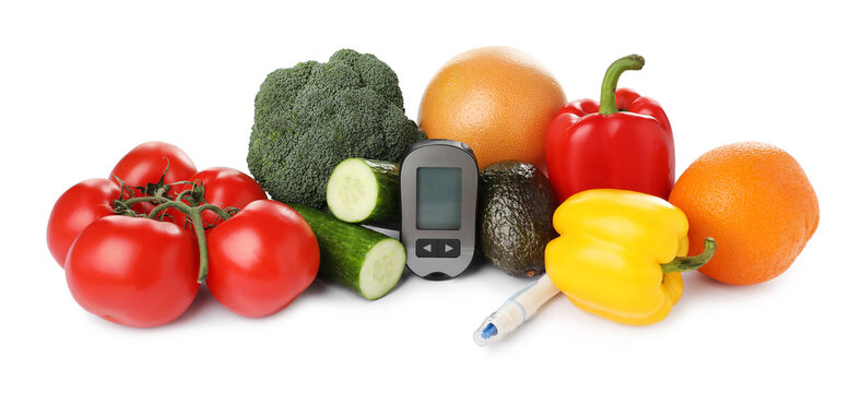 Diabetes. Fresh vegetables, fruits, digital glucometer and lancet pen isolated on white