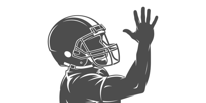 Strong American Football Player in Helmet Raising Hand as a Symbol of Play or Victory