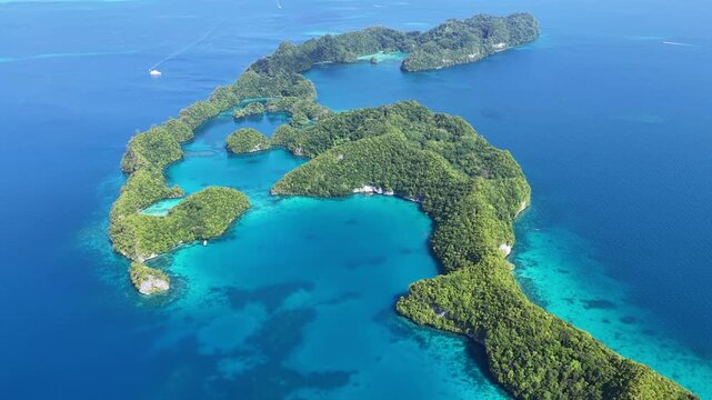 Shallow, fringing coral reefs thrive amid Palau's scenic Ulong Islands. This tiny and beautiful island-nation is a popular destination for divers, snorkelers, kayakers, and World War II buffs. 