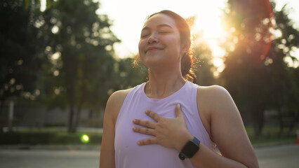 Asia young Gen Z people mindful happy woman open arm relax body deep stress relief outdoor nature...
