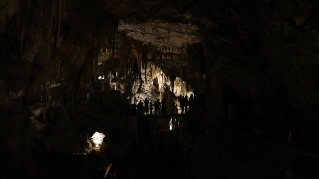 view from inside postojna cave (postojnska jama) famous deep cave system in slovenia europe with train inside rail ride km walk walking interior rock formations stalactite stalagmite ancient geology 
