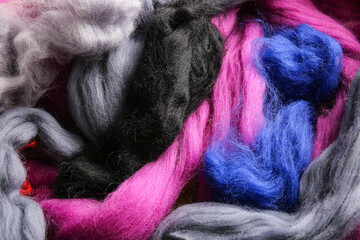 Texture of different wool for felting as background, closeup © Pixel-Shot