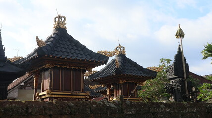 Fototapeta premium additional room for Hindu worship in the yard of an original Balinese traditional house. Photo raw, no edit. Klumpu Jineng. Bale Kulkul