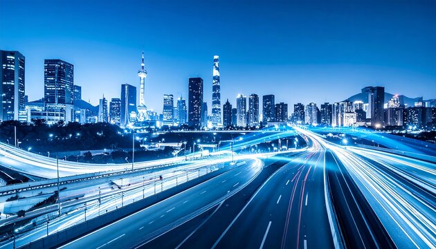 Cityscape at twilight with long exposure light trails along the multiple lane freeway