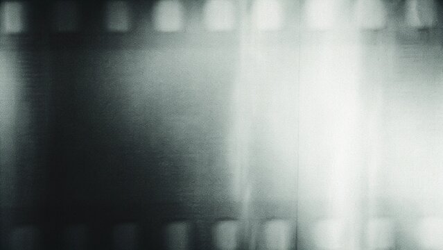 Retro film texture overlay featuring scratched photo damage, dust particles, light leaks, grain noise and vignette frame, distressed analog background with widescreen vintage aesthetic