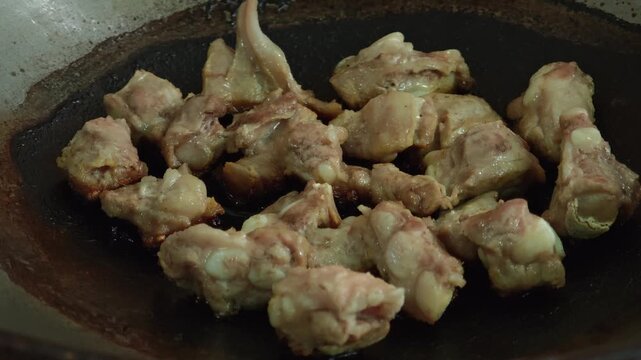 The pork was burnt in the pan.The pork was burnt in the pan.