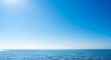 Fototapeta premium Tranquil Ocean Horizon Under Clear Blue Sky