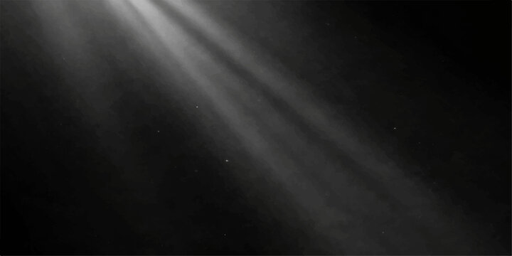 Dramatic rays of light pierce the darkness, illuminating floating dust particles in a mystical, ethereal atmosphere.