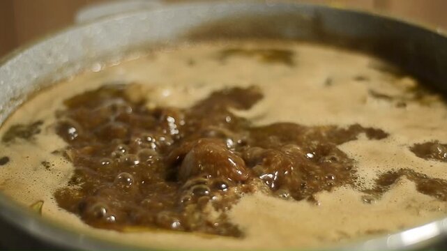 Tender beef ribs immersed in aromatic konro soup, a popular Indonesian dish known for its rich savory flavor.