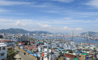 Obraz premium Landscape of busan harbor, south korea. Bridge, building, cityview, blue.