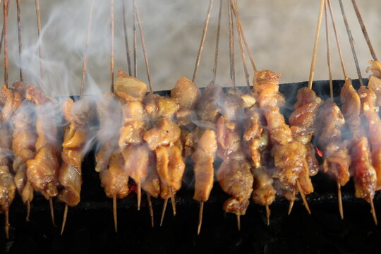 Sate Ambal is a chicken satay typical of the Kebumen area of Central Java. This satay is made from chicken meat seasoned with spices. Sate is cooked by grilling on a charcoal grill. Indonesian food.