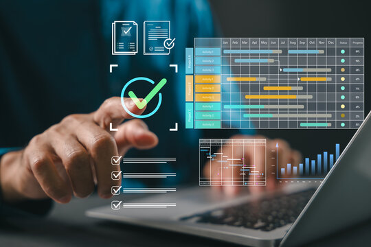 Project manager plans work using Gantt chart schedule, utilizes dashboard for corporate timeline, shows deliverables on laptop screen, hand touches checkmark for business productivity