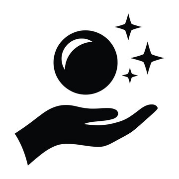 Hand holding crystal ball with sparkles
