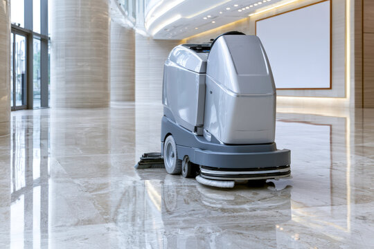 Floor Scrubber Machine Cleaning Polished Lobby in Commercial Building