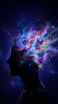 Surreal silhouette of a human head with a colorful glowing galaxy and cosmic nebula exploding from the brain
