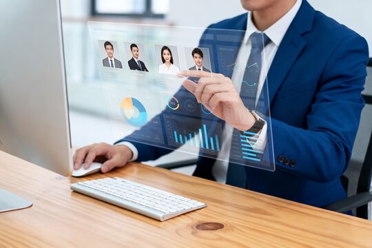 Businessman interacting with digital data interface