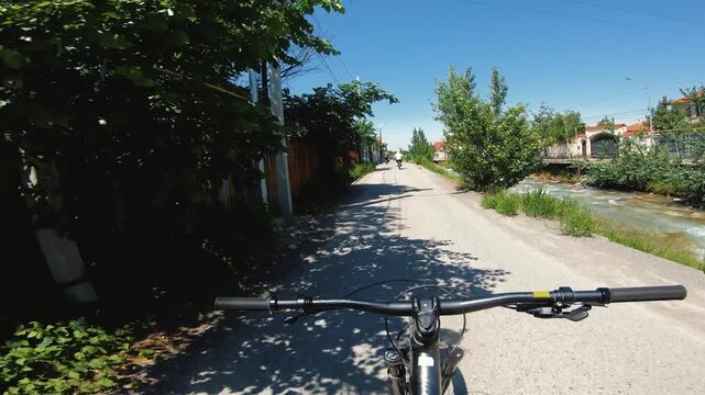 Cyclist ride bicycle at city road