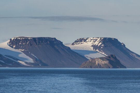 Flat table mountains covered with ice, Franz Josef Land archipelago, Russia
