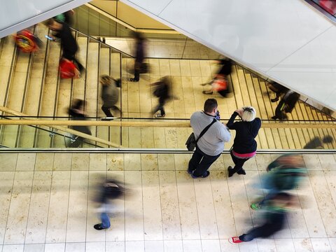 People hurry, walk on stairs Passage, Hamburg, Germany