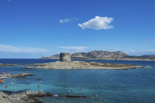 Old watchtower on the beach La Pelosa, Sardinia, Italy