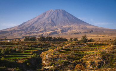 Panoramic sunset view of the majestic Misti volcano from the rural village of Chiguata in Arequipa, Peru © Helard