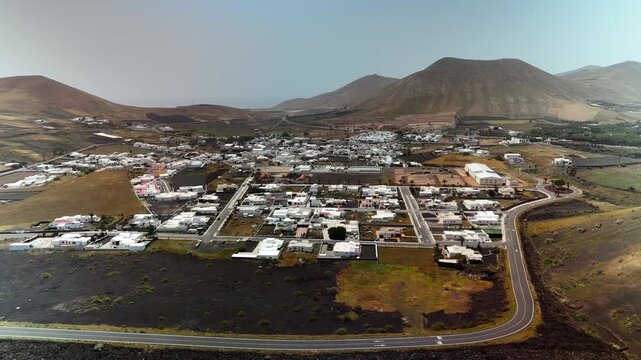 Aerial drone view of Uga and volcanic lava fields, Lanzarote, Spain
