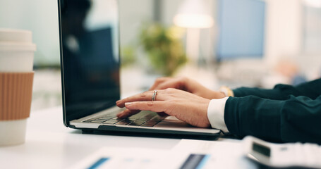 Fototapeta premium Hands, laptop and typing with business woman at desk in office for planning, research or review. Coffee, computer and keyboard with employee person in workplace for email feedback, job or report