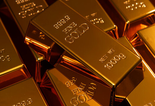 24k gold for metal reserve. Fine gold concept. Gold for investment and trading. Gold bar background.