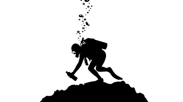 A silhouette of a scuba diver exploring the rocky ocean floor.