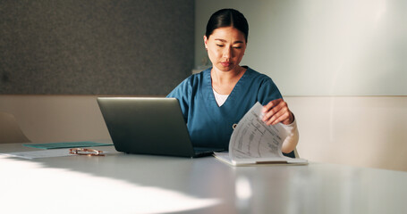 Nurse, paperwork and woman with laptop in clinic, administration or reading medical records on web....