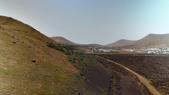 Aerial drone view of volcanic cone and La Geria vineyards, Lanzarote