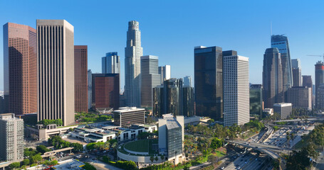 Fototapeta premium Los Angeles skyline with skyscrapers. Los Angeles downtown cityscape. Los Angeles business district view. Los Angeles freeway with traffic.