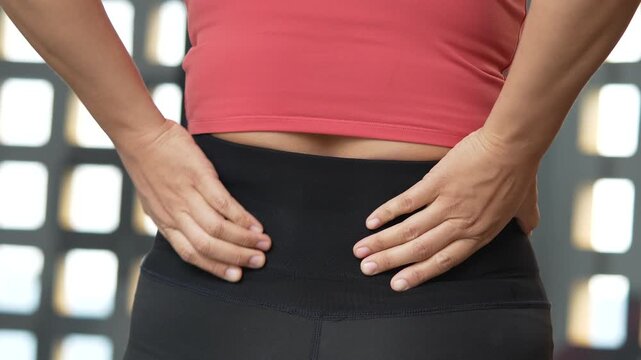 Women have backaches because of heavy lifting.	
