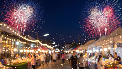Fototapeta premium Street market comes alive with blurred crowds and hanging string lights as massive fireworks burst in the dark sky above the bustling outdoor evening bazaar.