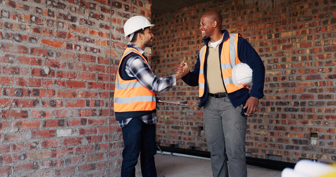 Handshake, men and civil engineers on site with deal, agreement or collaboration for building. Teamwork, industry and male construction workers shaking hands for renovation contract with partnership.