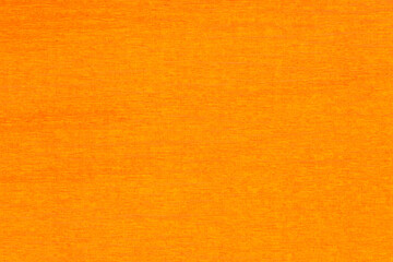 Fototapeta premium blank orange color backdrop: close up of crepe paper texture