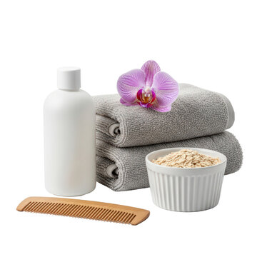 Spa essentials with towels lotion comb and orchid for relaxation