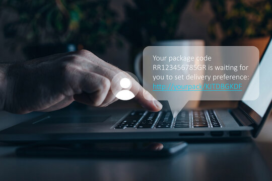 Scam message about package delivery arrives on computer screen at late night