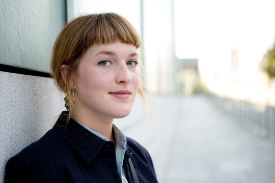 Portrait of strawberry blonde young woman with nose piercing