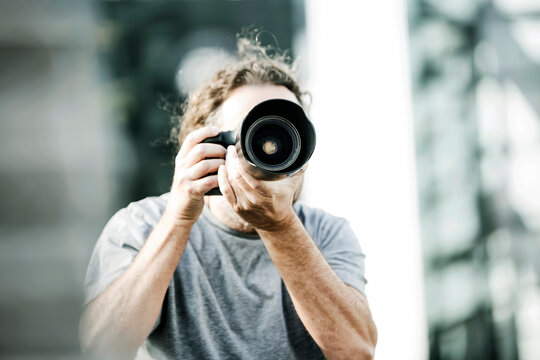 Man pictures with camera