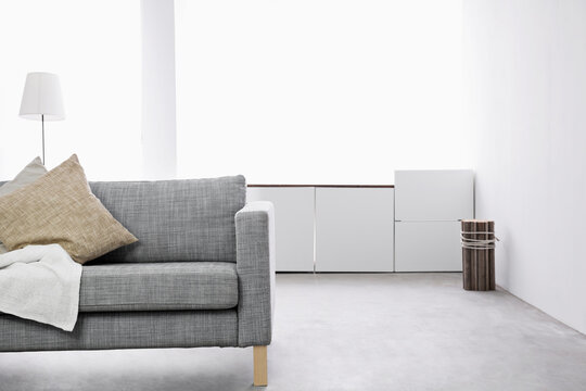 Modern living room with couch and sideboard